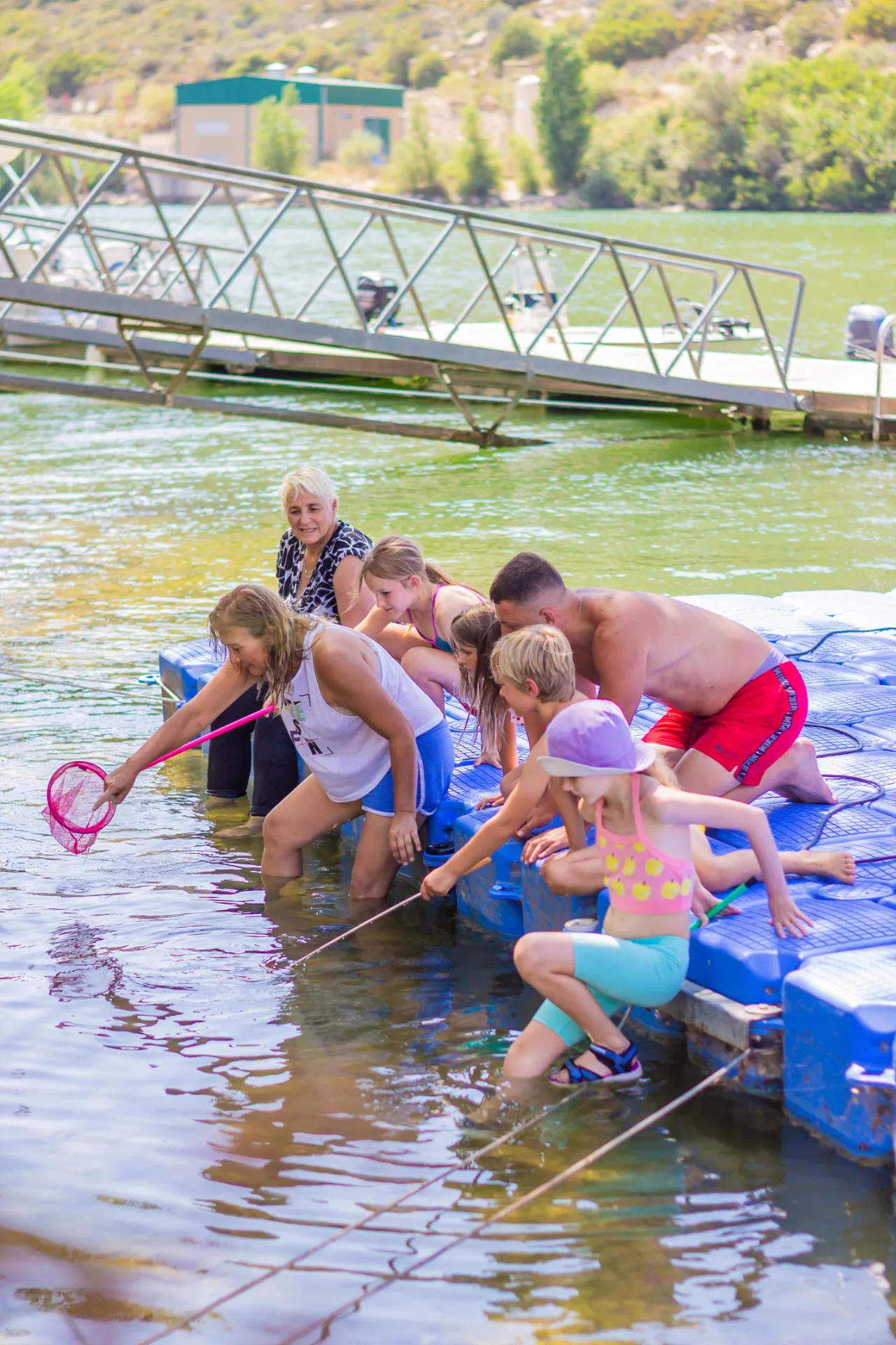 Camping and fishing activities with children by the river